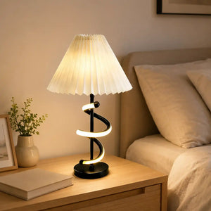 Spiral design bedside lamp with pleated lampshade