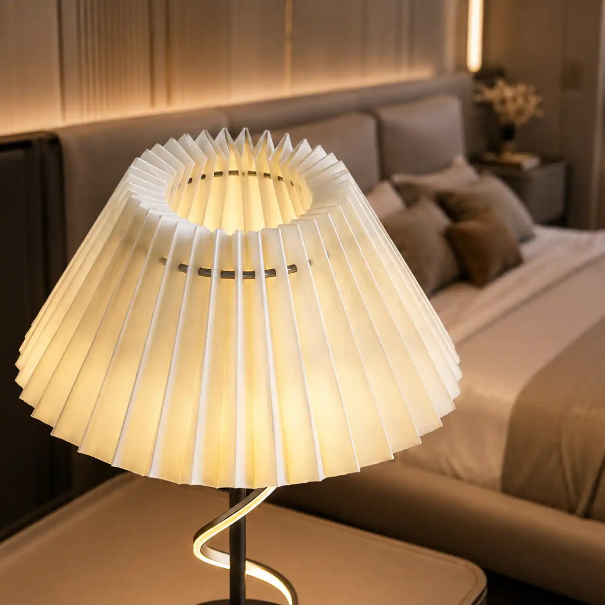 Spiral design bedside lamp with pleated lampshade